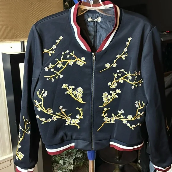 NWT Holly Bracken navy blue bomber with a cherry blossom design, size small - Picture 1 of 6